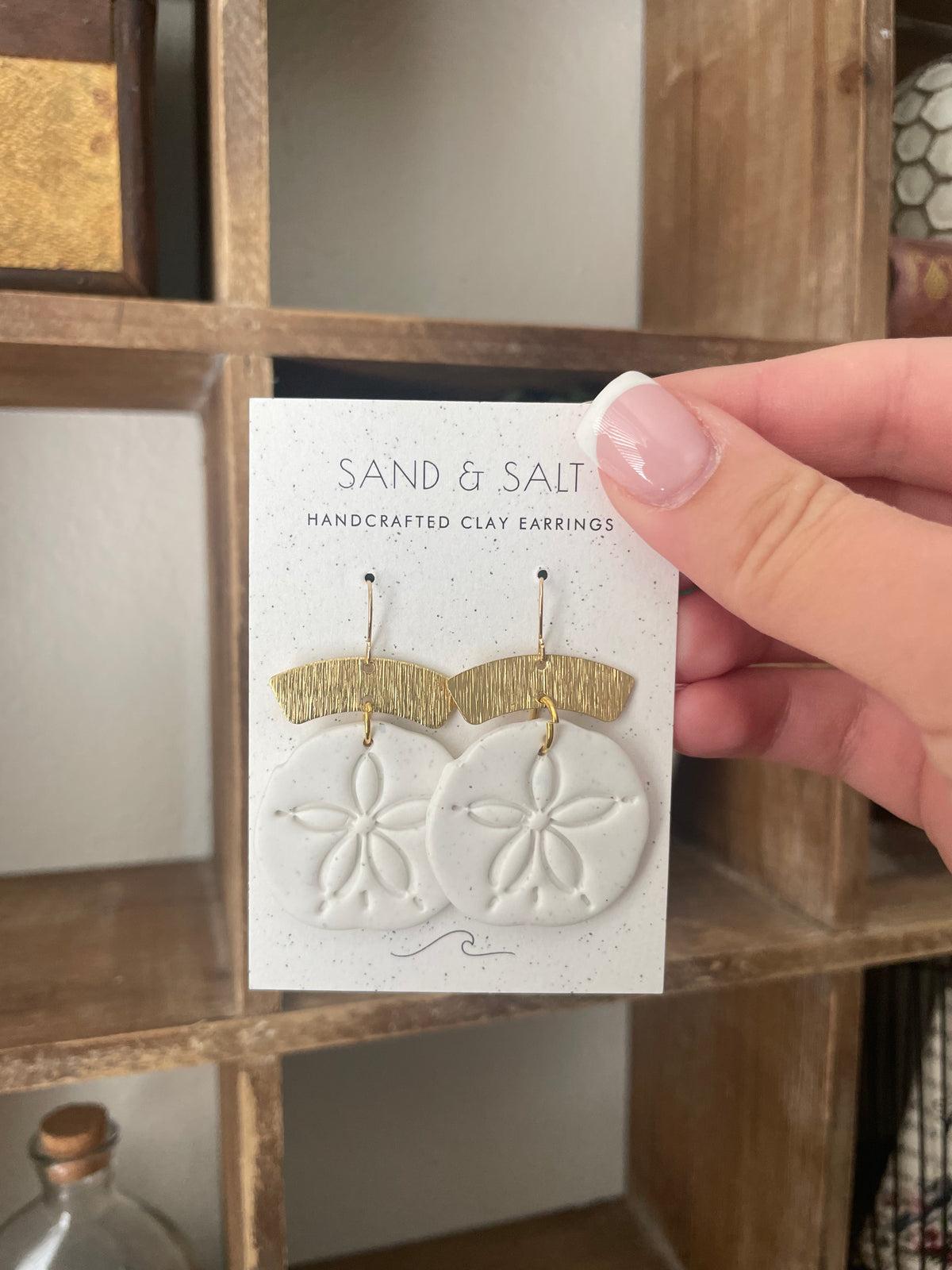 Sand dollar dangle