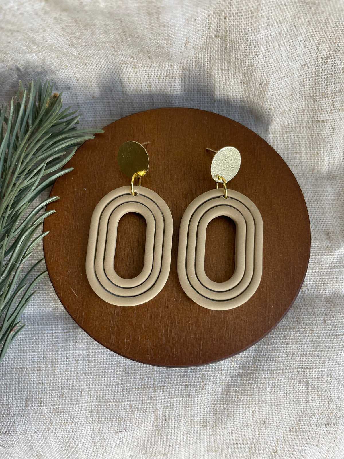 Embossed oval