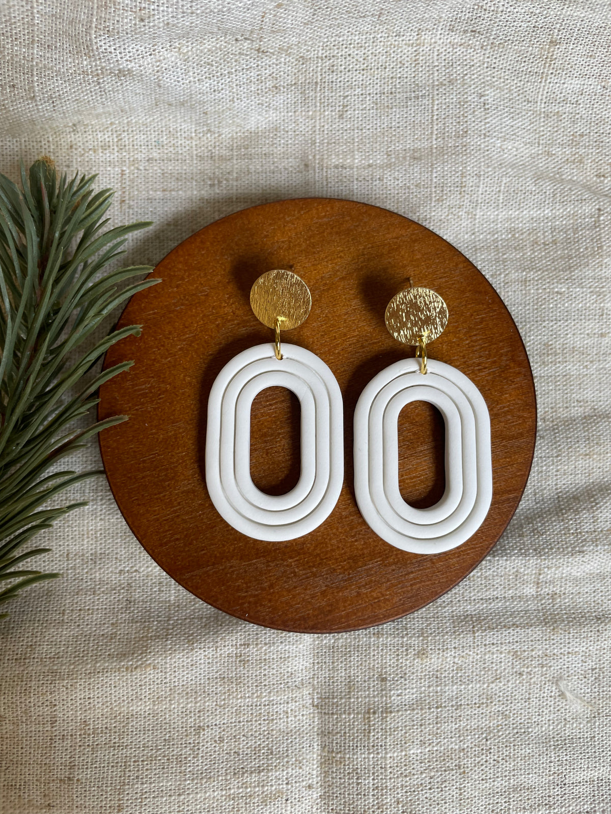 Embossed oval